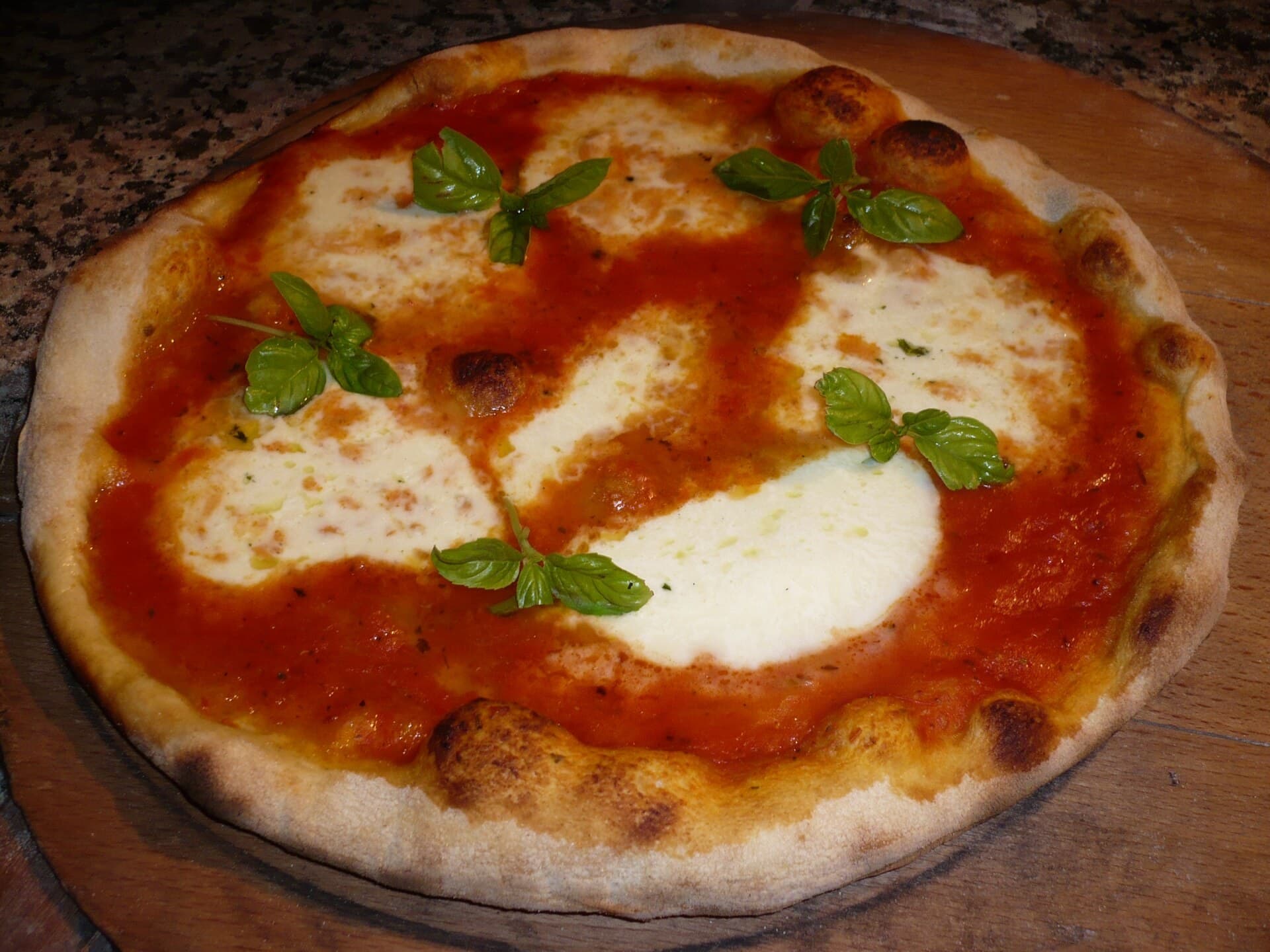 A Neapolitan-style margherita pizza with basil